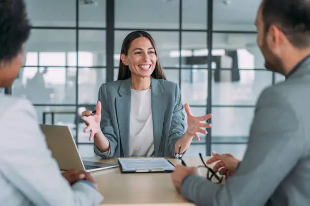 A thoughtful person reviewing documents and considering professional Will Writing Services Leicester.